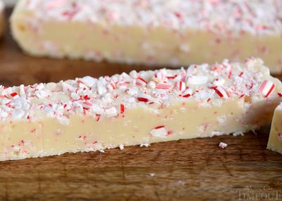 Tis the season for peppermint and sweets! You can have the best of both with this Practically Perfect Peppermint Fudge! Just a handful of ingredients and five minutes are all you need to make this pretty and festive fudge! // Mom On Timeout